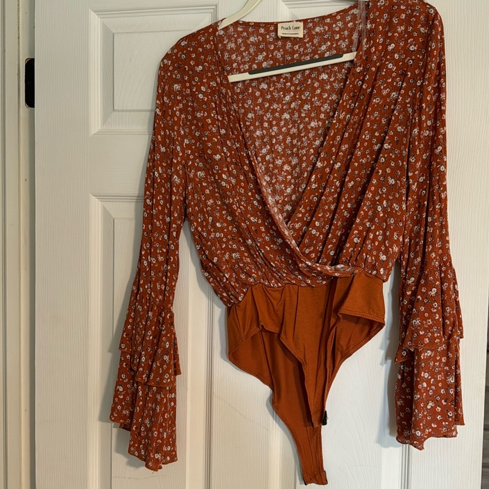 Burnt orange fall floral long sleeve bodysuit